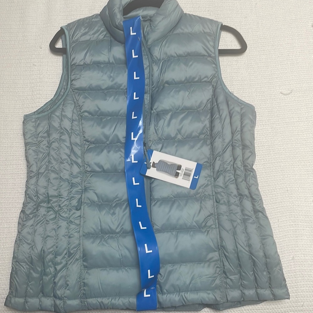 Brand new blue puffer vest